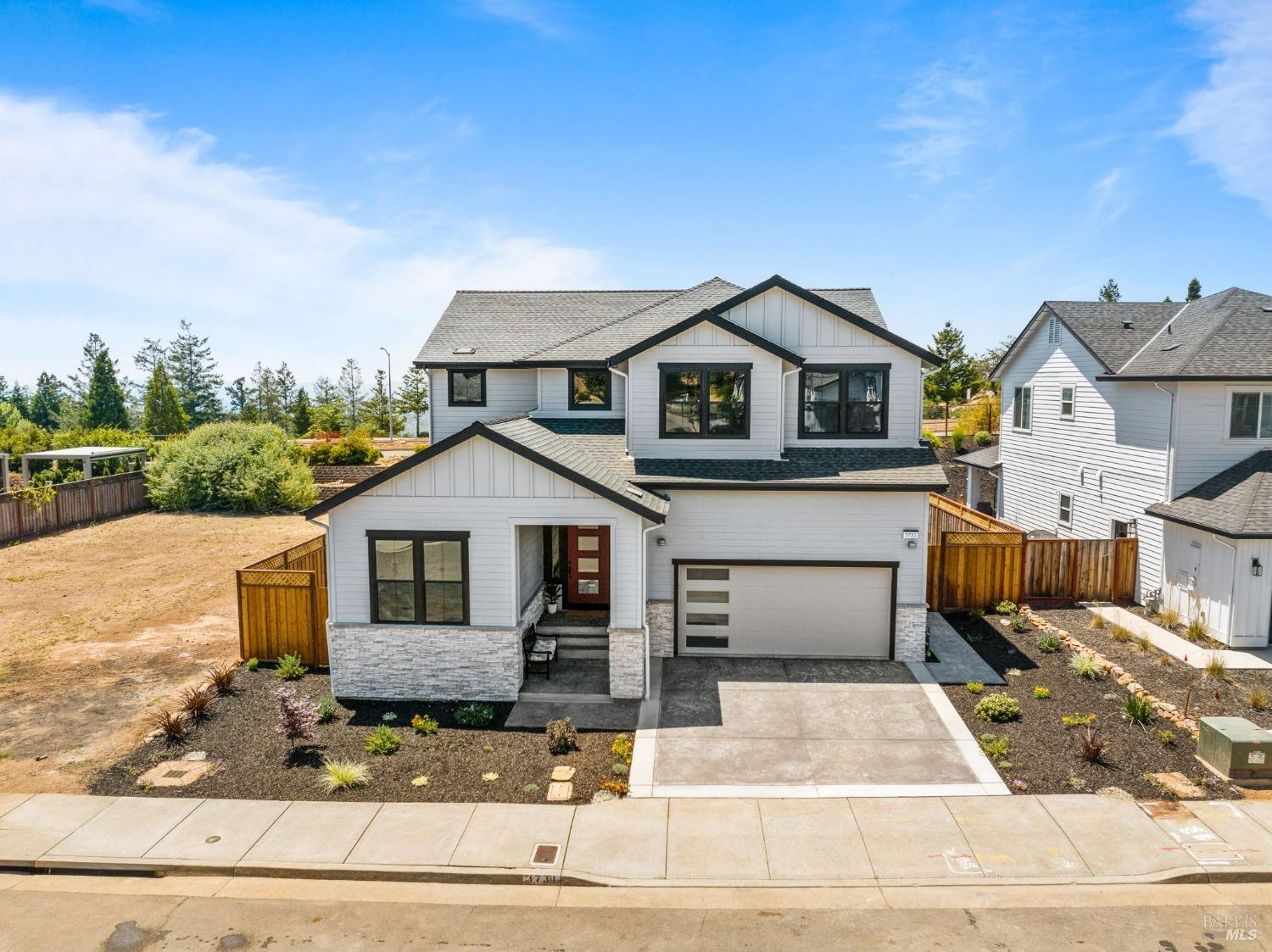 3731 Paxton Place Santa Rosa, CA 95404 - Photo 1 of 1 a front view of a house with a garage