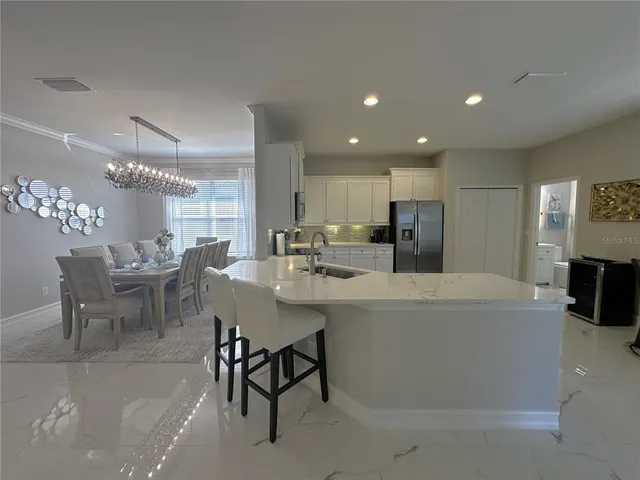 a bedroom with a bed and a tv