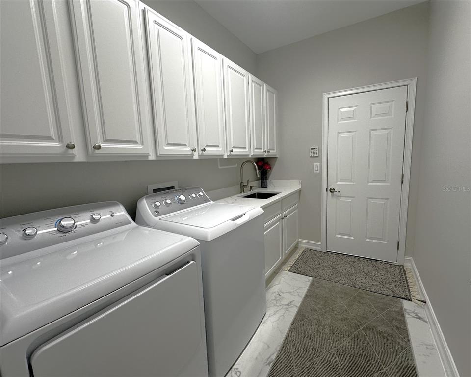 25191 Keygrass Court Punta Gorda, FL 33955 - Photo 36 of 66 a room with storage and utility