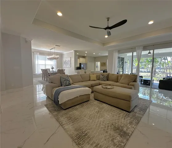 a kitchen with refrigerator and microwave