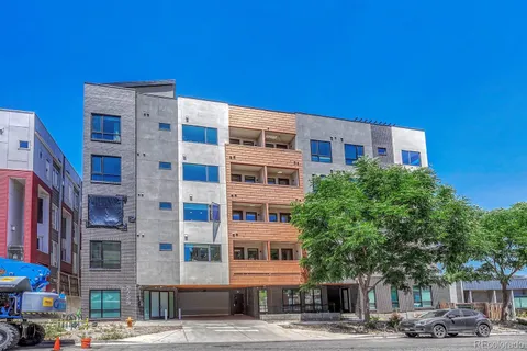 a front view of a building with street view
