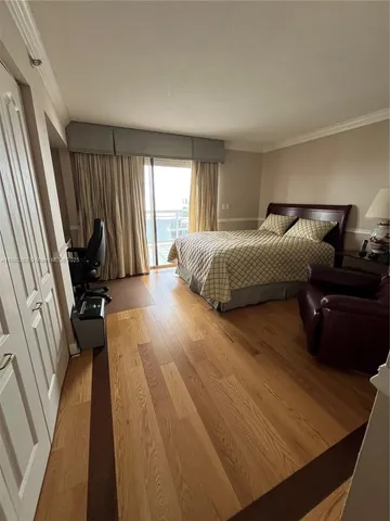 a kitchen with sink cabinets and microwave