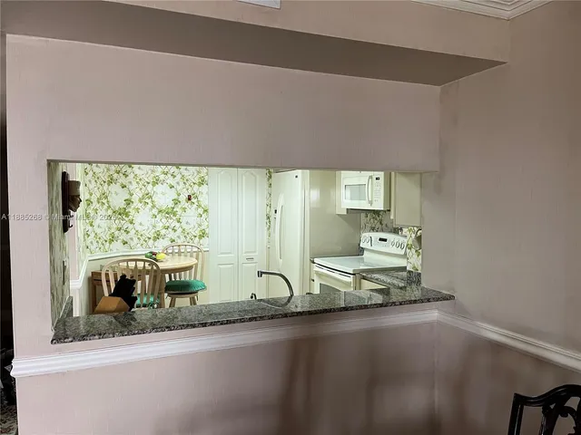 a view of a lake with a car parked