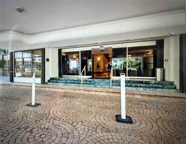 a view of a living room and dining room