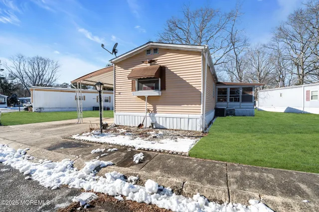 a front view of house with yard