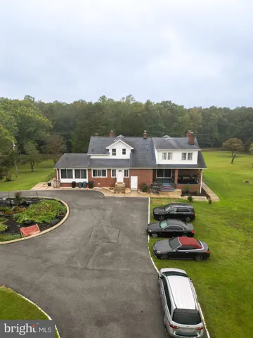 a front view of a house with parking space