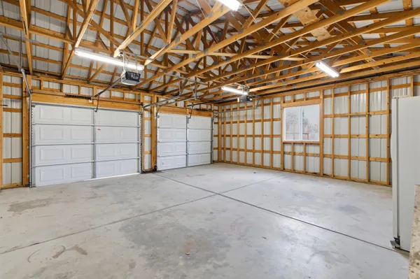 a view of an empty room with white walls