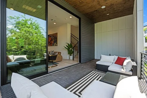 a outdoor living space with furniture and a patio