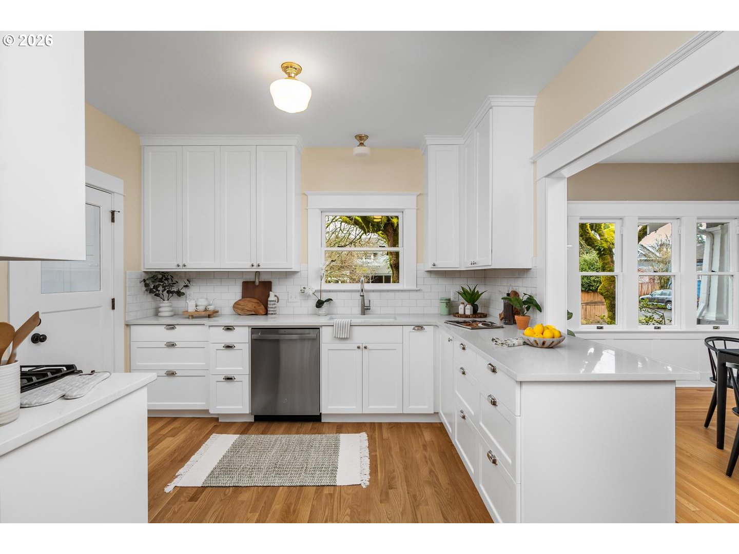 1239 Northeast Sumner Street Portland, OR 97211 - Photo 15 of 48 a kitchen with sink cabinets and window