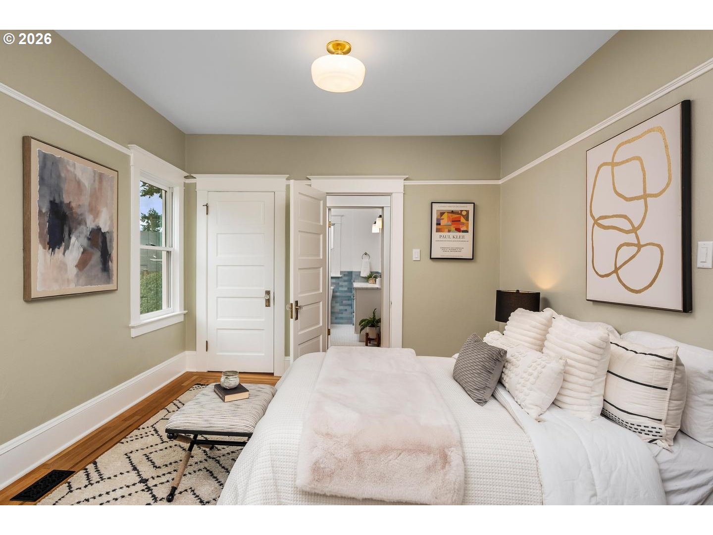 1239 Northeast Sumner Street Portland, OR 97211 - Photo 20 of 48 a bedroom with a large bed and a window