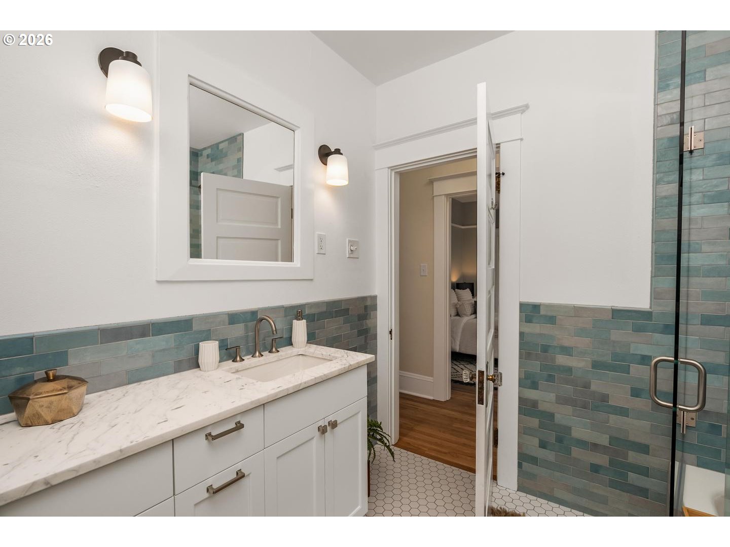 1239 Northeast Sumner Street Portland, OR 97211 - Photo 22 of 48 a bathroom with a sink and a mirror
