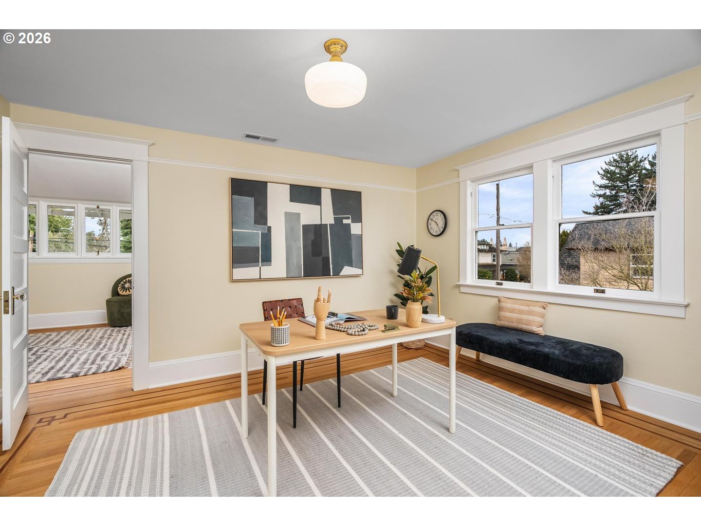 1239 Northeast Sumner Street Portland, OR 97211 - Photo 28 of 48 a living room with a couch and a table