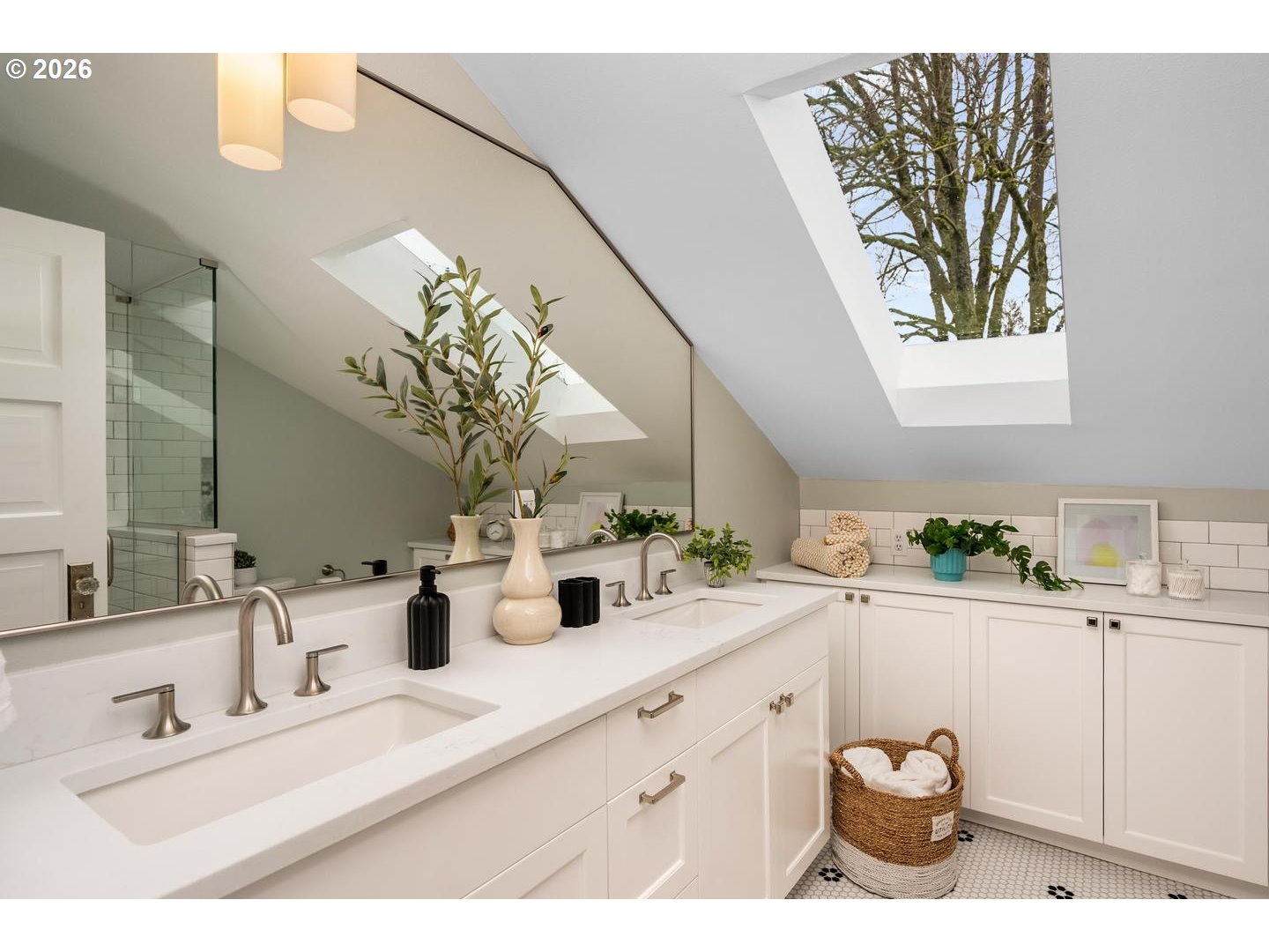 1239 Northeast Sumner Street Portland, OR 97211 - Photo 30 of 48 a bathroom with a sink a mirror and a potted plant