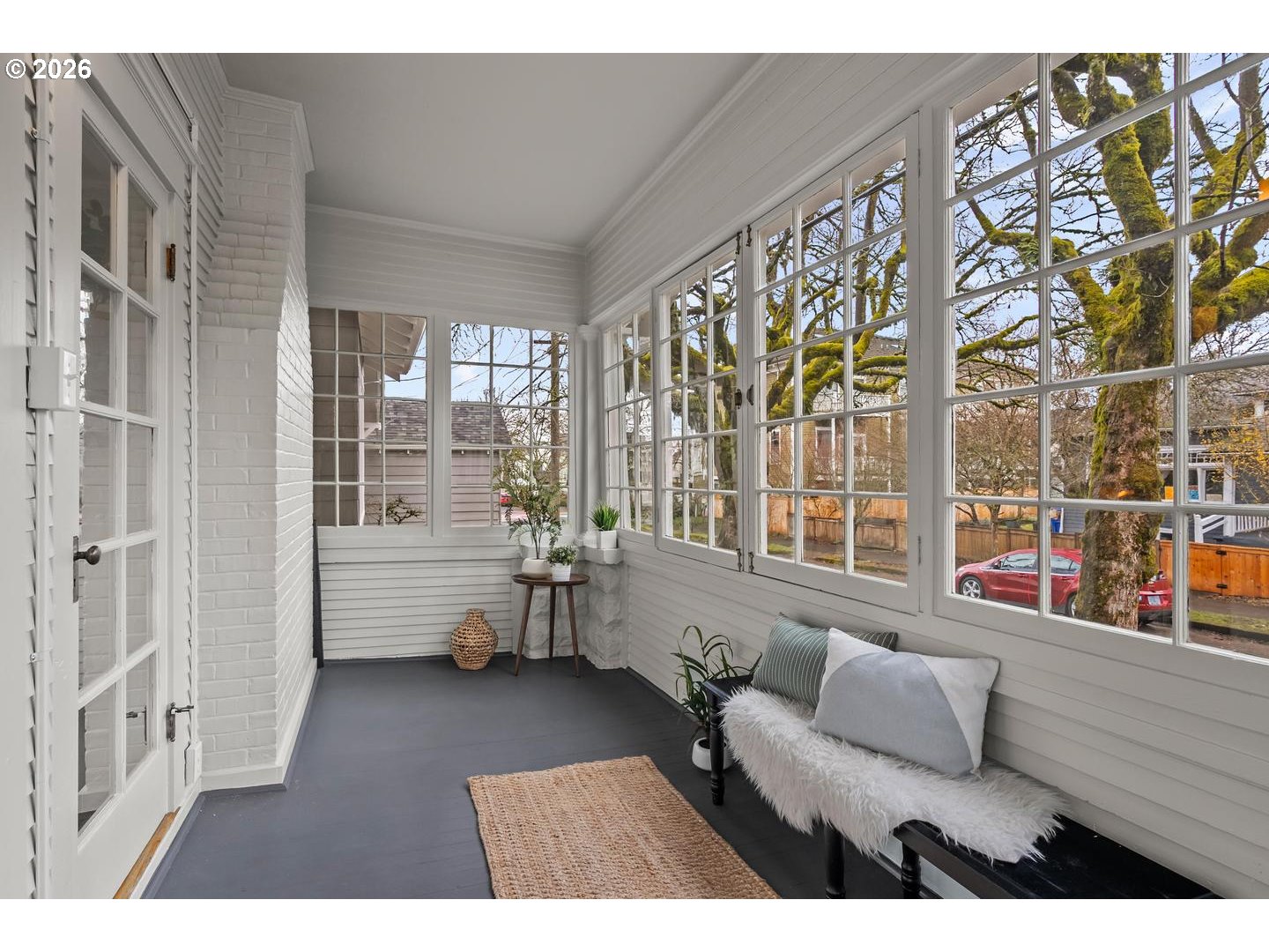 1239 Northeast Sumner Street Portland, OR 97211 - Photo 4 of 48 a living room with furniture and a large window