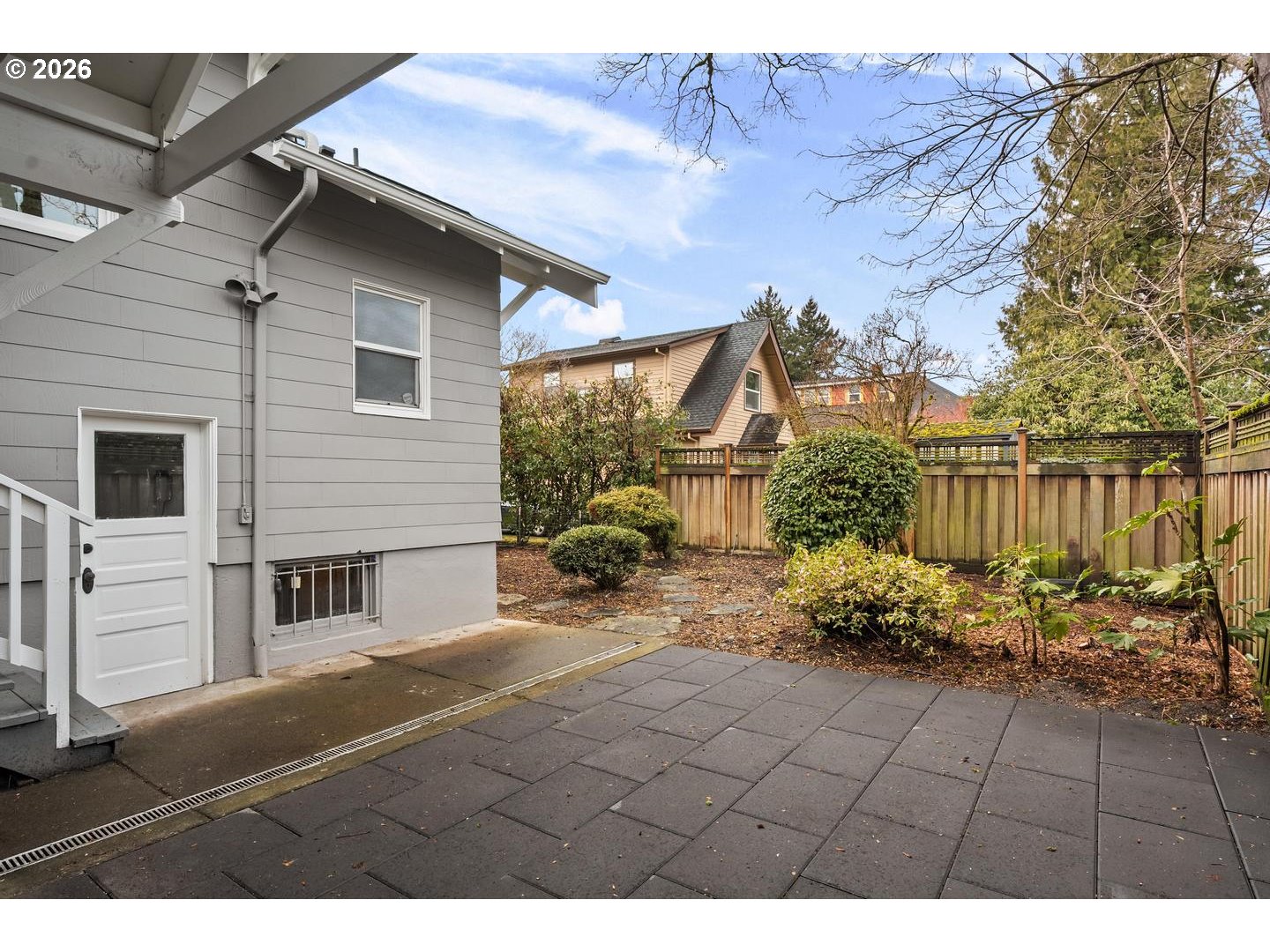 1239 Northeast Sumner Street Portland, OR 97211 - Photo 44 of 48 a view of a house with a bench