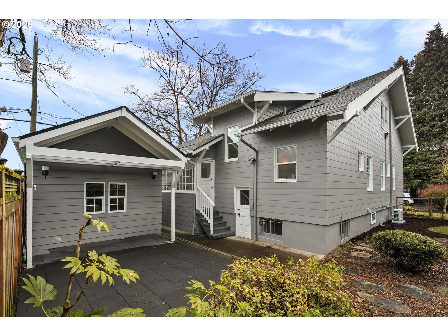 1239 Northeast Sumner Street Portland, OR 97211 - Photo 45 of 48 a view of a house with a yard