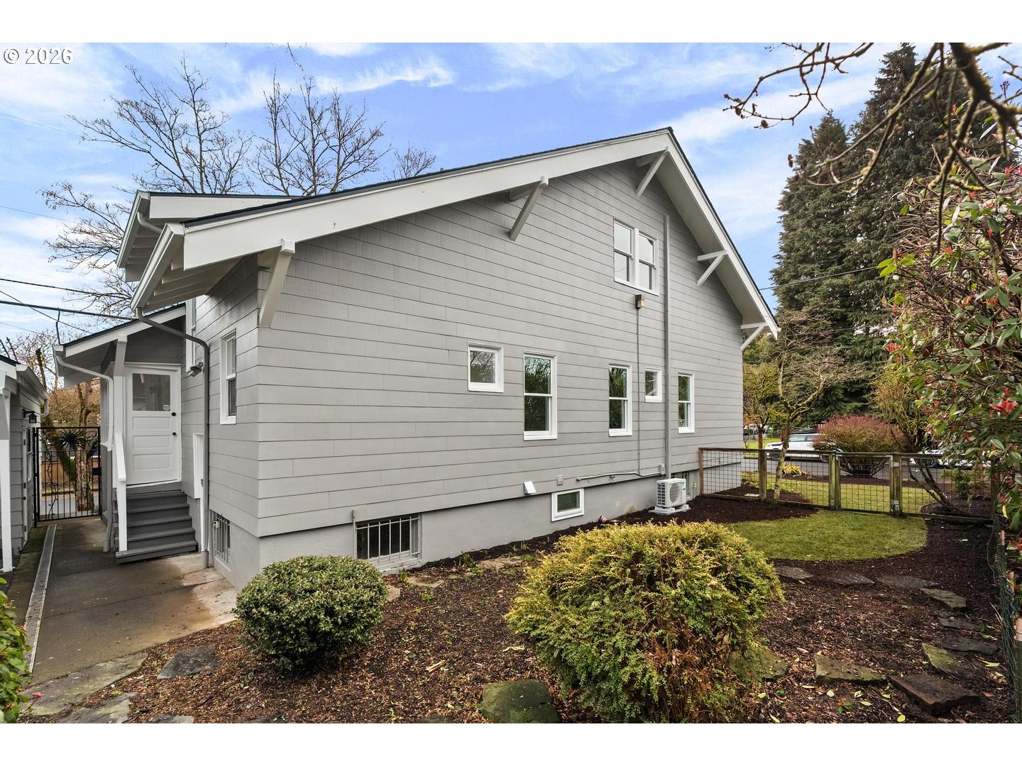 1239 Northeast Sumner Street Portland, OR 97211 - Photo 46 of 48 a view of a house with a yard