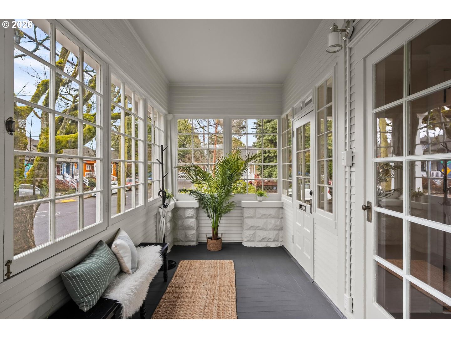 1239 Northeast Sumner Street Portland, OR 97211 - Photo 5 of 48 a living room with furniture and large windows