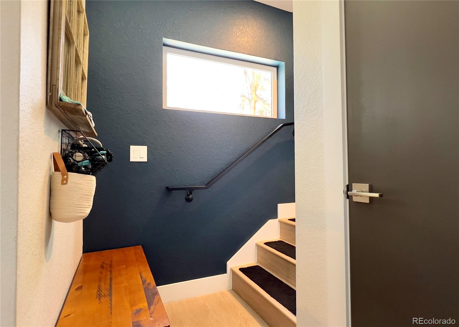 6228 West 38th Avenue Wheat Ridge, CO 80033 - Photo 24 of 38 a view of entryway and hall with wooden floor