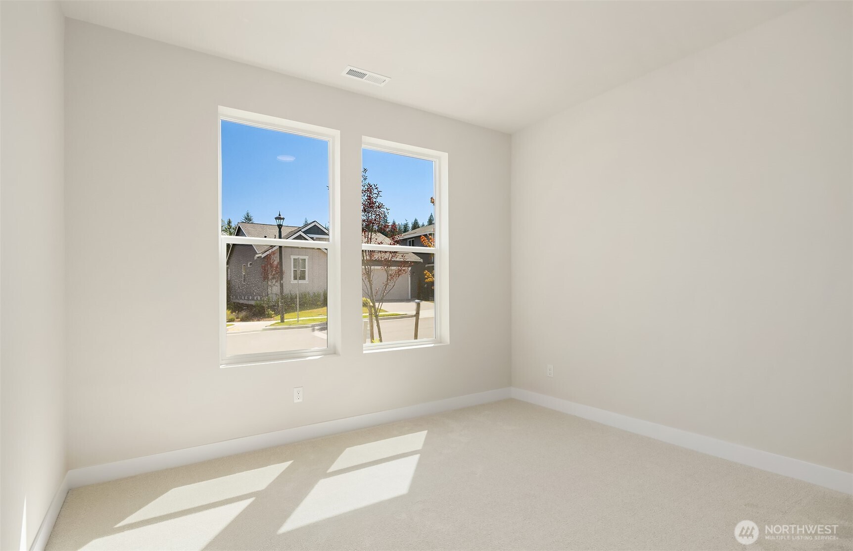 23361 Arbors Terrace Road Northeast, Unit 21 Kingston, WA 98346 - Photo 11 of 19 a view of an empty room with a window