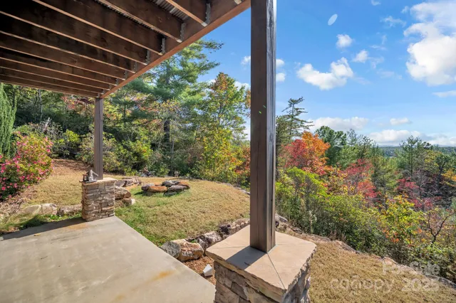 a kitchen with kitchen island a stove and a refrigerator