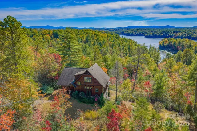 a view of a houses with a lake view