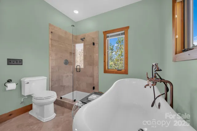 a bathroom with a sink and shower