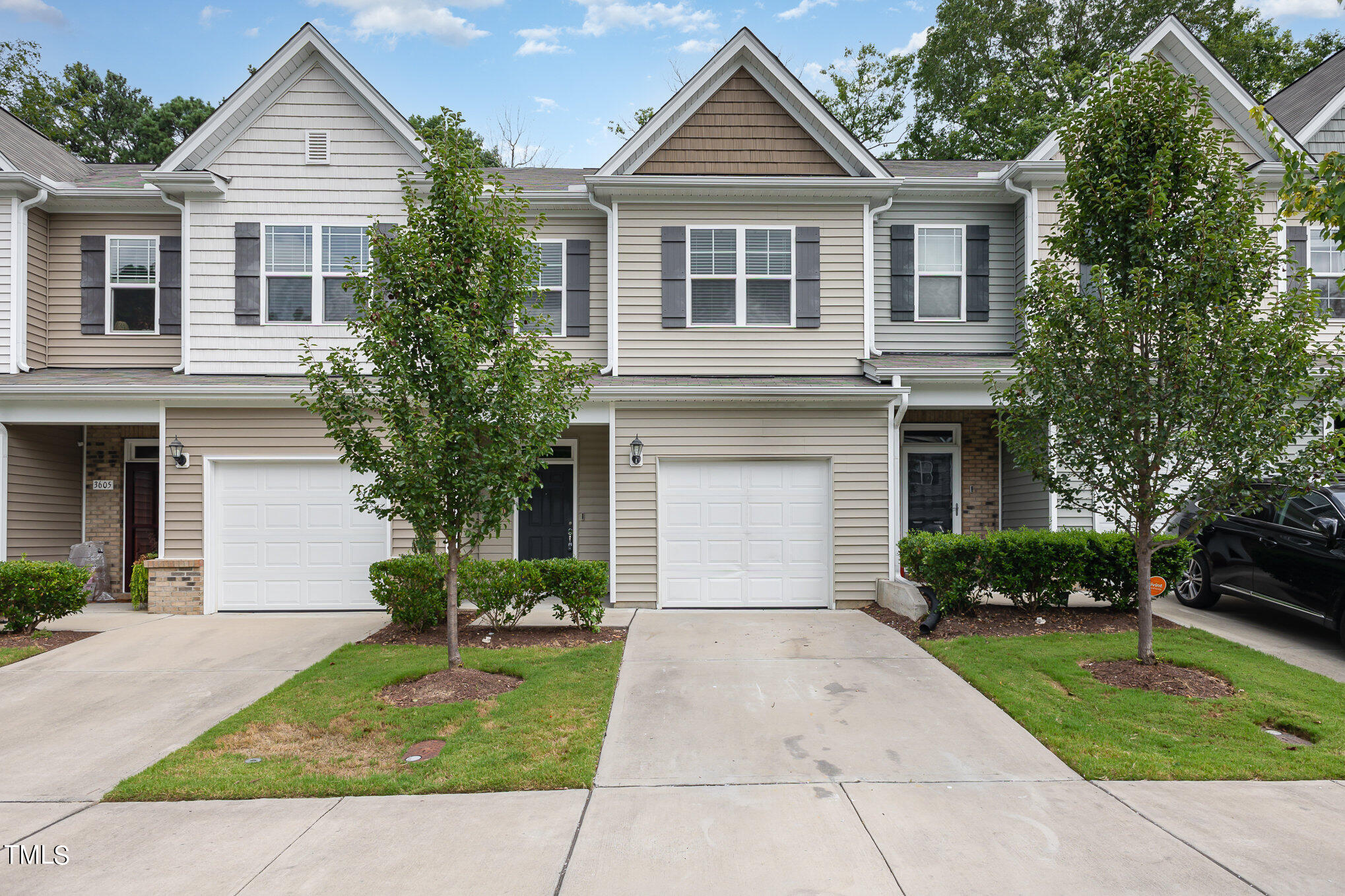 3607 Water Mist Lane Raleigh, NC 27604 - Photo 1 of 30 a front view of a house with a yard and trees