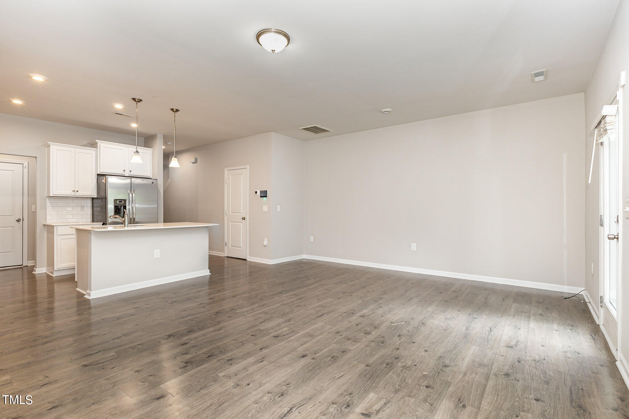 3607 Water Mist Lane Raleigh, NC 27604 - Photo 11 of 30 a view of kitchen with wooden floor