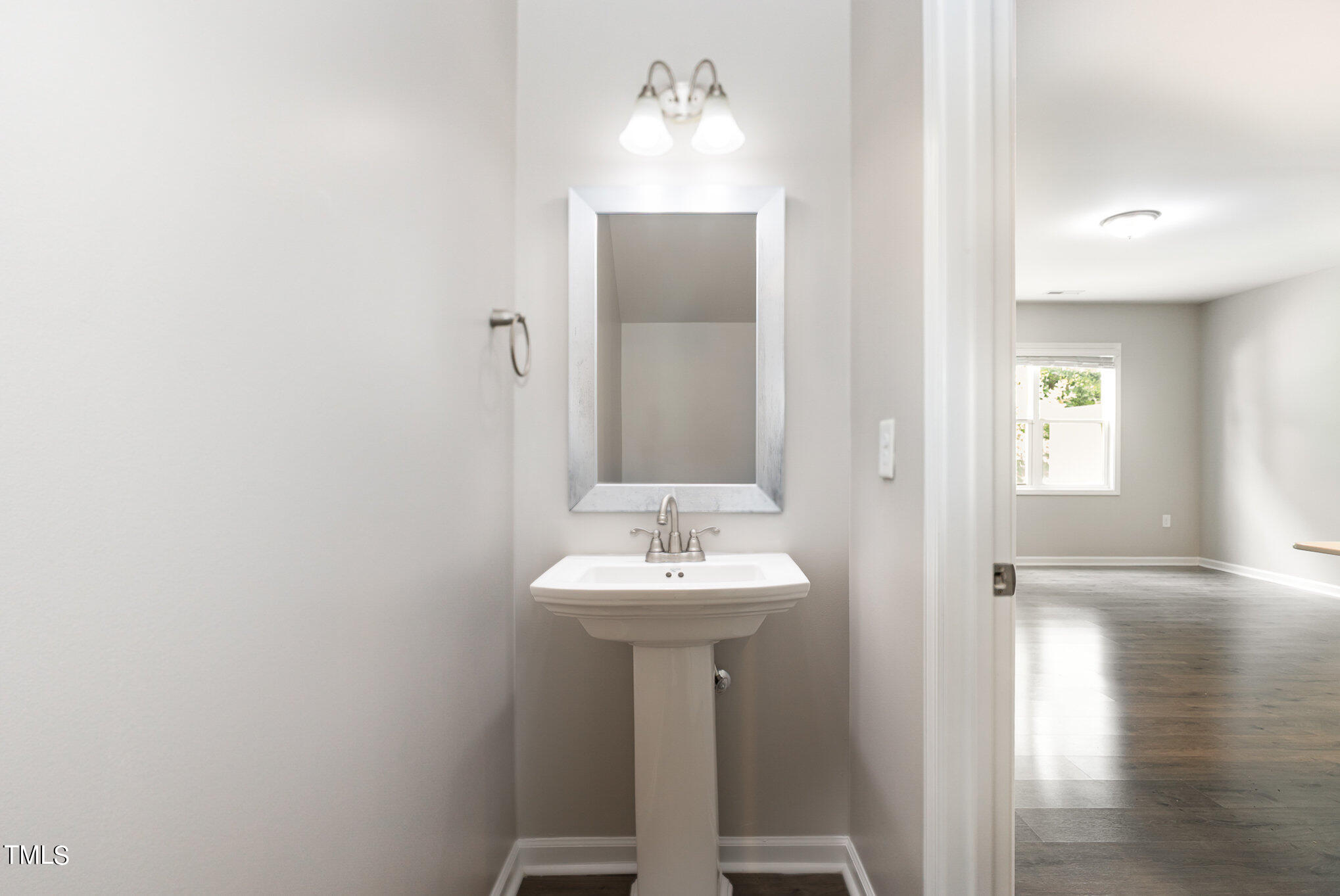 3607 Water Mist Lane Raleigh, NC 27604 - Photo 16 of 30 a bathroom with a sink and a mirror