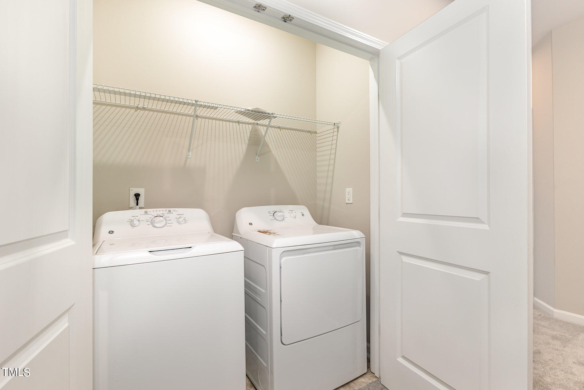 3607 Water Mist Lane Raleigh, NC 27604 - Photo 17 of 30 a utility room with dryer and washer