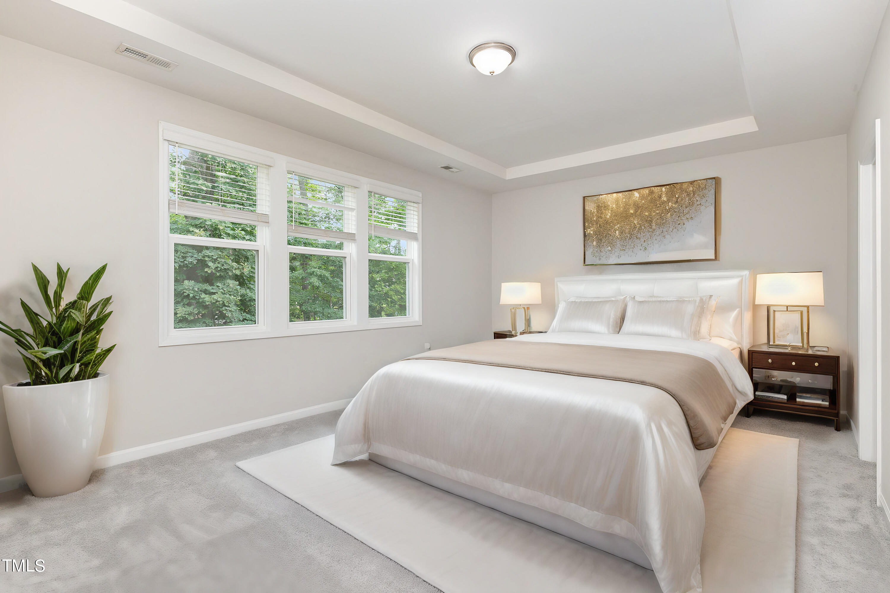 3607 Water Mist Lane Raleigh, NC 27604 - Photo 18 of 30 a bedroom with a large bed and a window