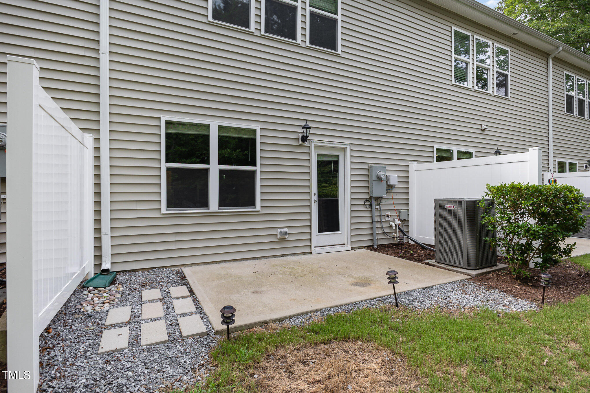3607 Water Mist Lane Raleigh, NC 27604 - Photo 28 of 30 a view of a house with a yard and a garage