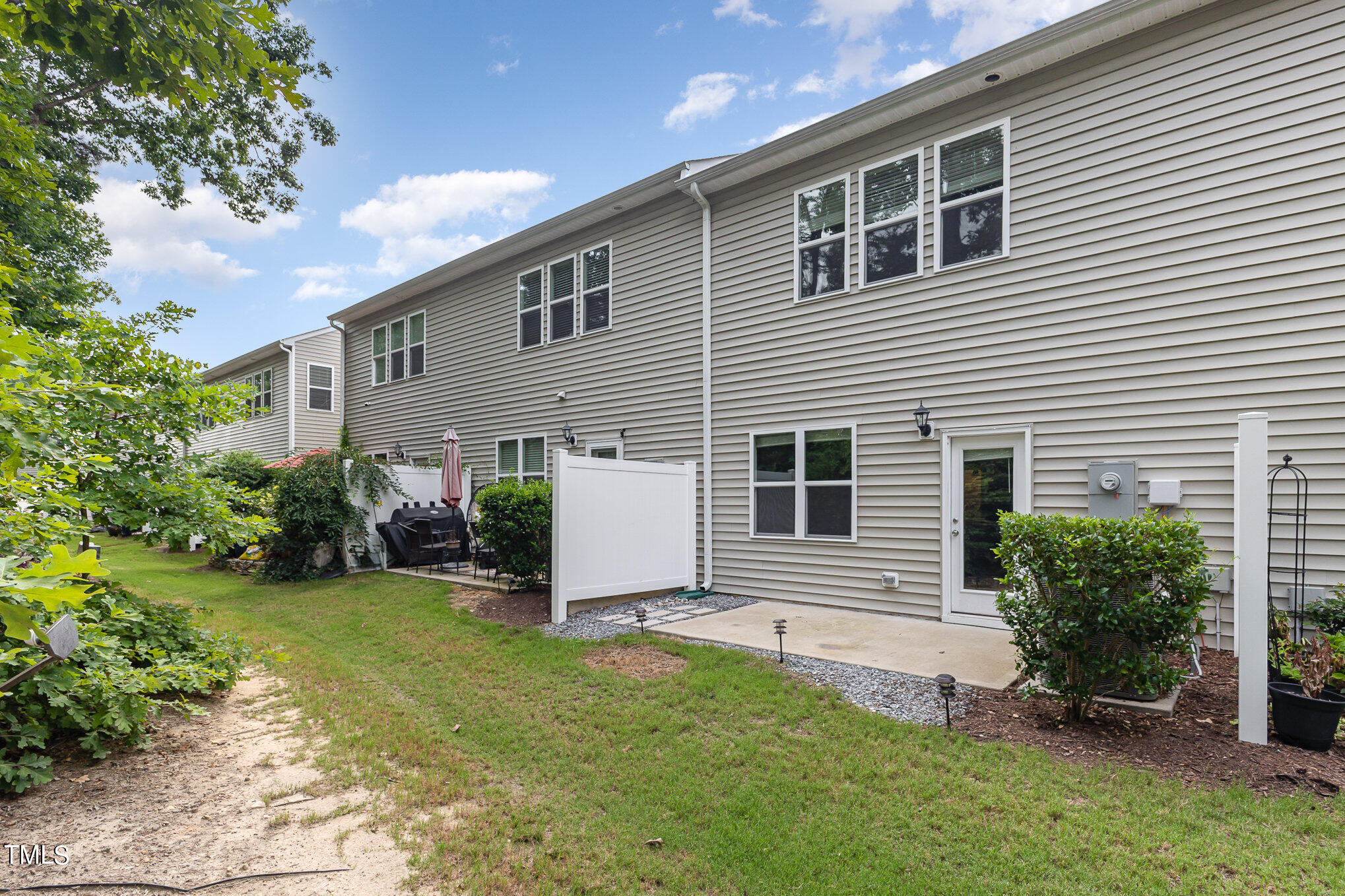 3607 Water Mist Lane Raleigh, NC 27604 - Photo 29 of 30 a view of a house with a yard