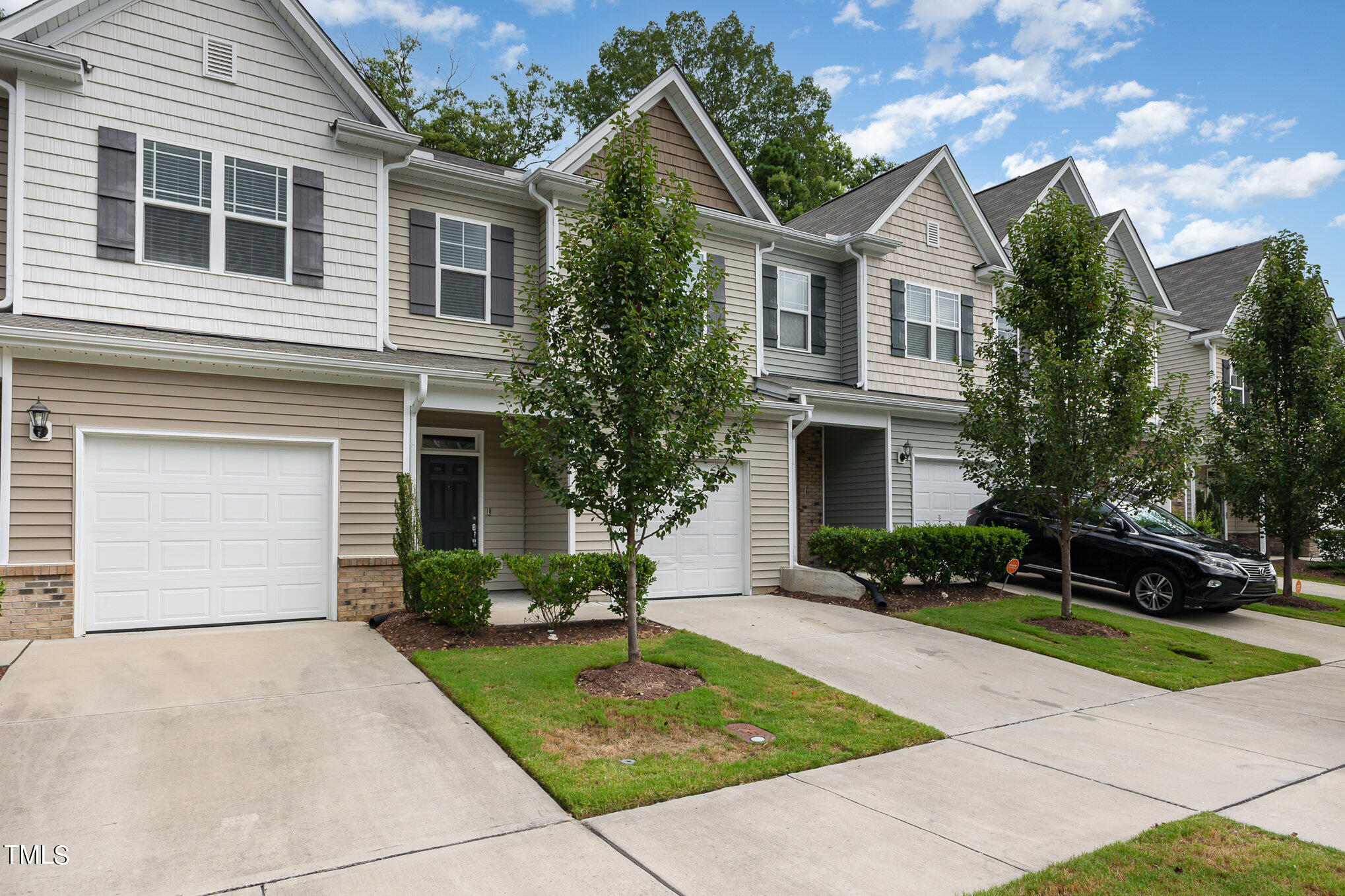 3607 Water Mist Lane Raleigh, NC 27604 - Photo 3 of 30 a front view of a house with garden