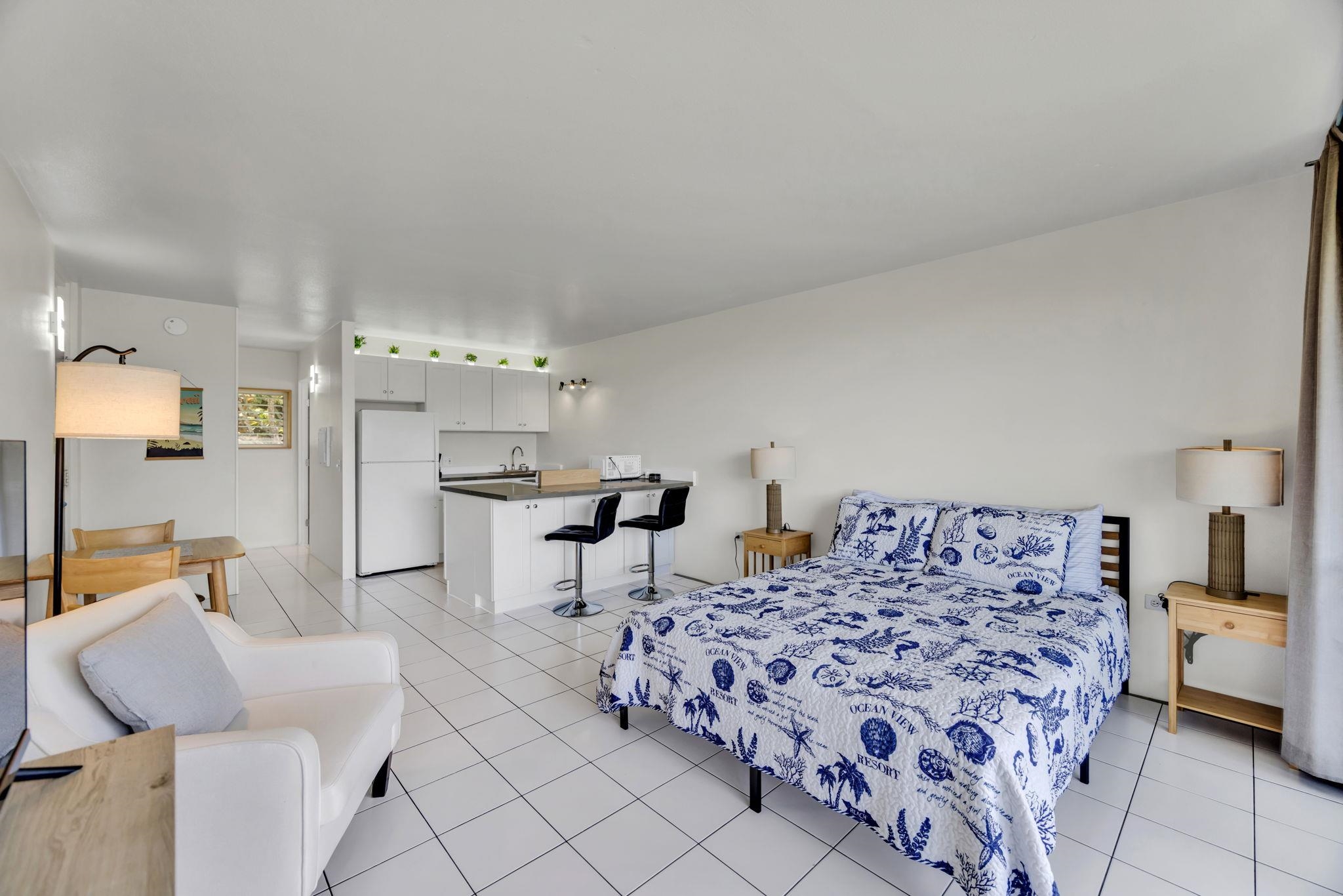 120 Hui Rd F, Unit E16 Lahaina, HI 96761 - Photo 15 of 24 a living room with furniture and a table