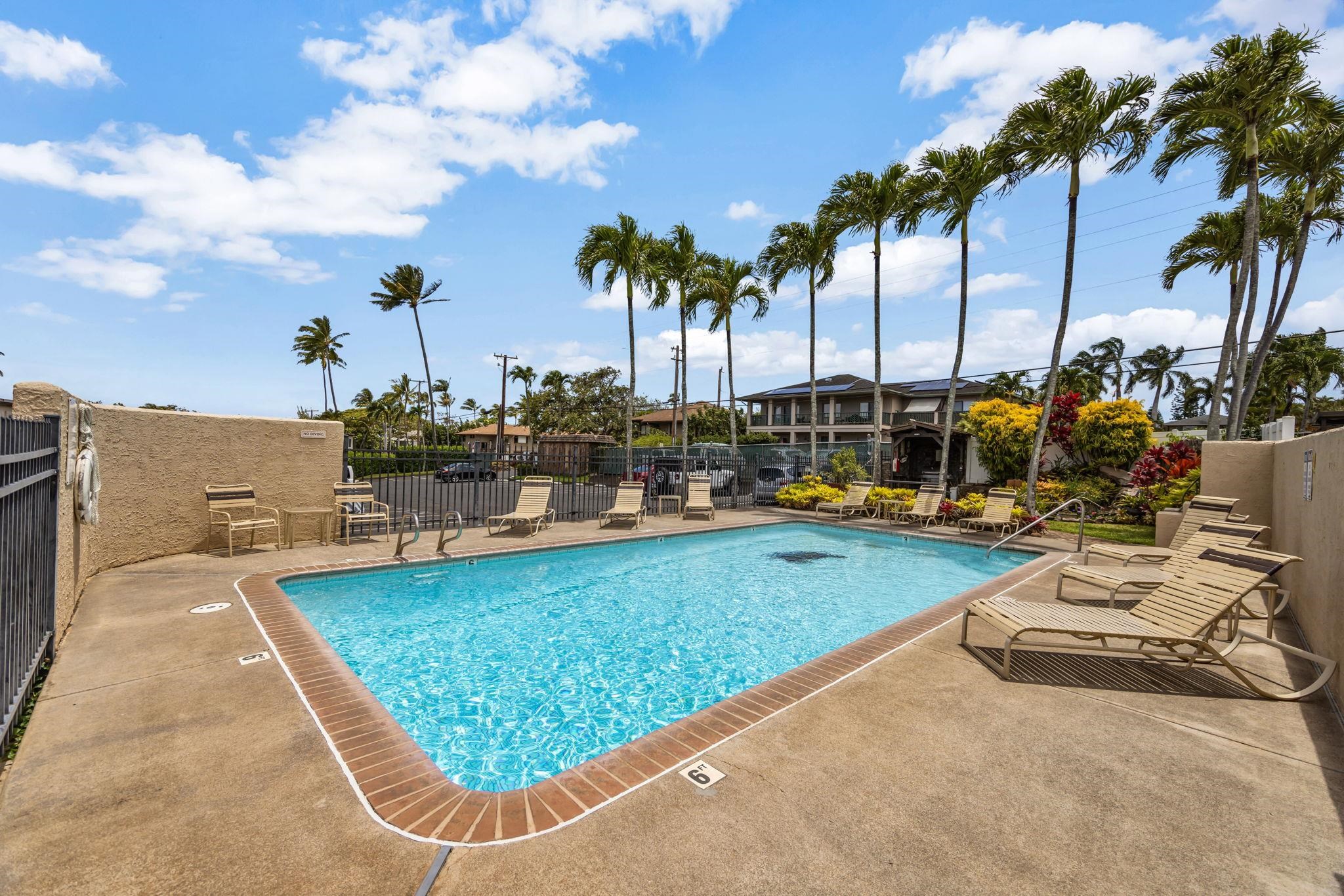 120 Hui Rd F, Unit E16 Lahaina, HI 96761 - Photo 18 of 24 a view of swimming pool with chairs