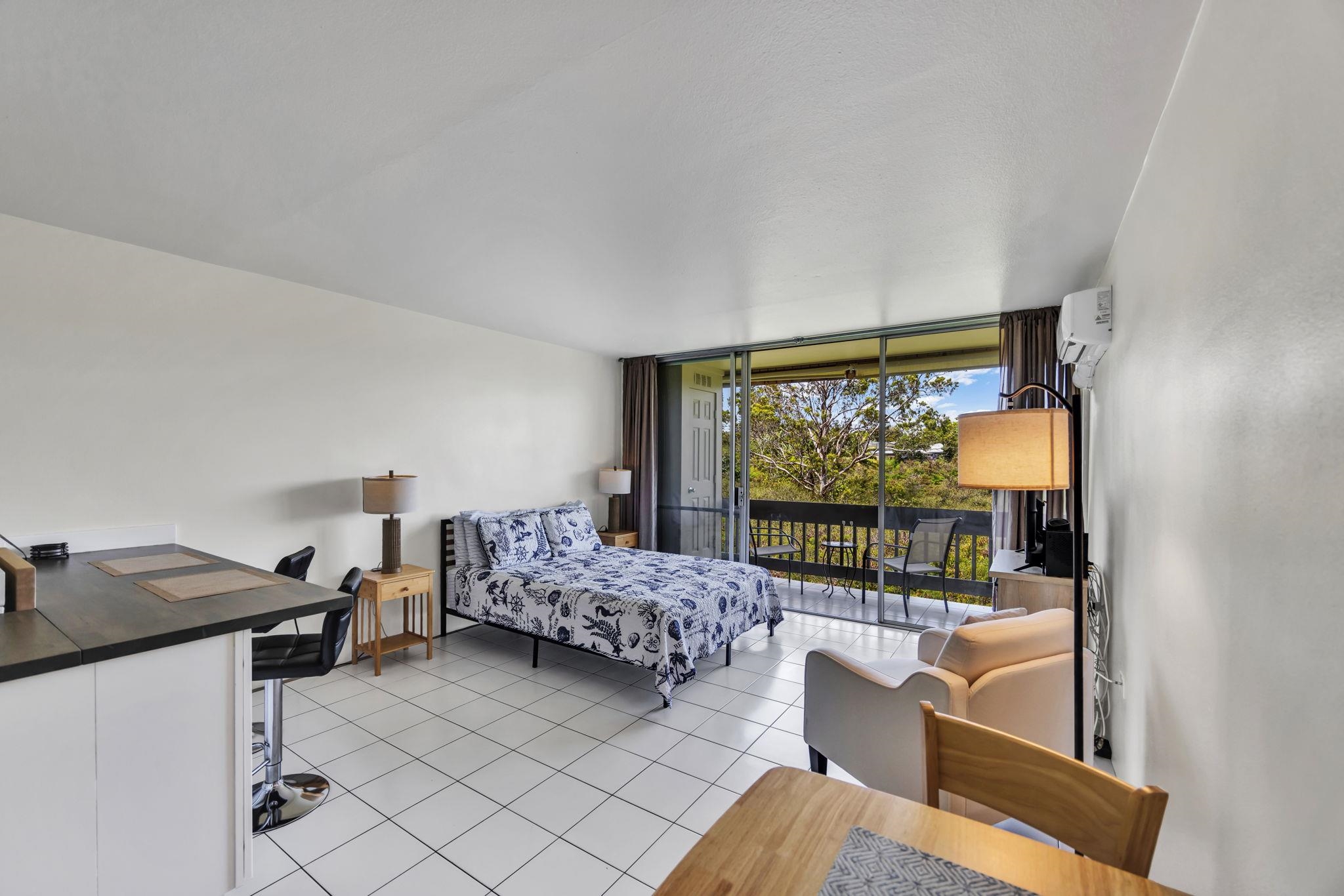 120 Hui Rd F, Unit E16 Lahaina, HI 96761 - Photo 7 of 24 a bedroom with furniture and large window