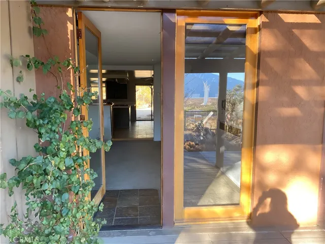 a view of a glass door with a glass door