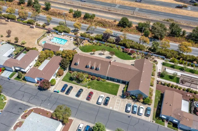 an aerial view of a city with lots of residential buildings