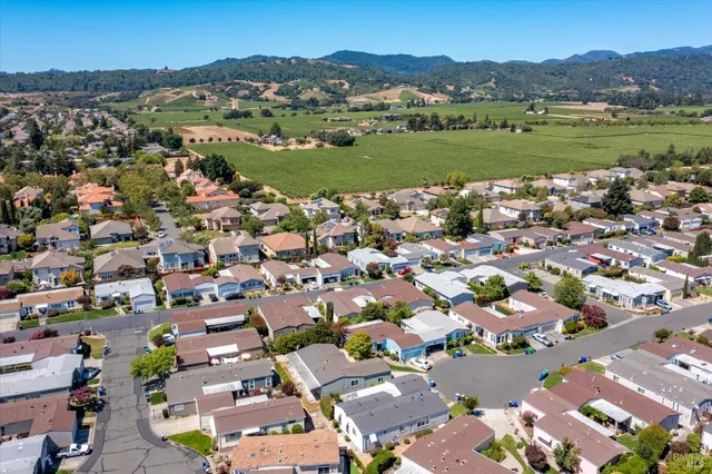an aerial view of a city with lots of residential buildings