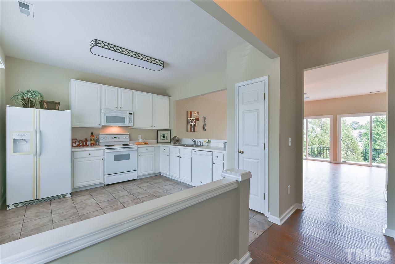 8133 Rhiannon Road Raleigh, NC 27613 - Photo 3 of 13 Cook amazing meals in this light filled kitchen