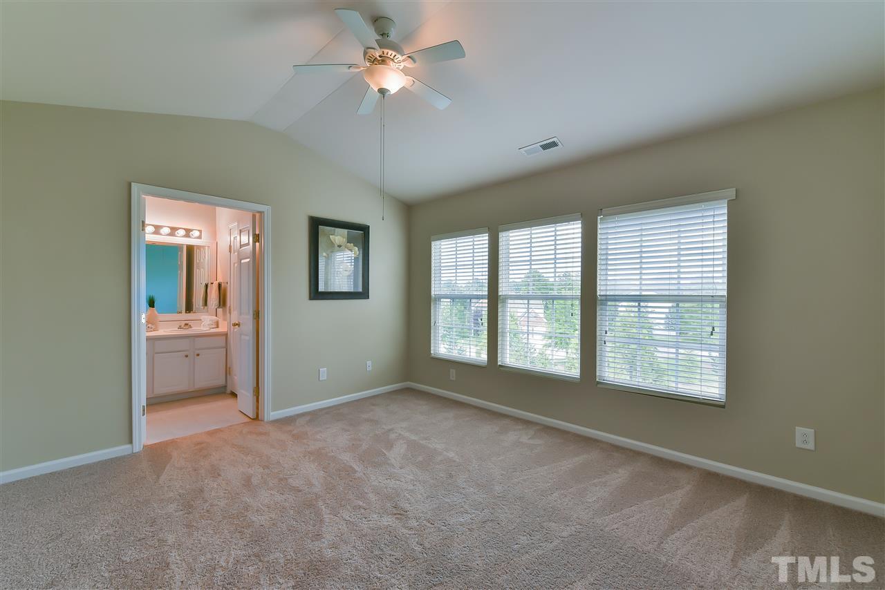 8133 Rhiannon Road Raleigh, NC 27613 - Photo 7 of 13 Spacious master bedroom with vaulted ceilings. Great for relaxing after a long day!
