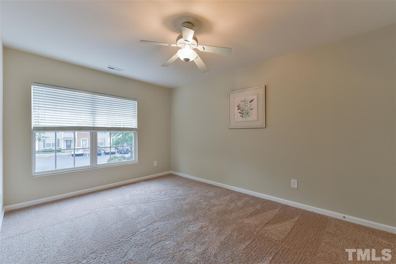 8133 Rhiannon Road Raleigh, NC 27613 - Photo 9 of 13 Generous light filled bedrooms.