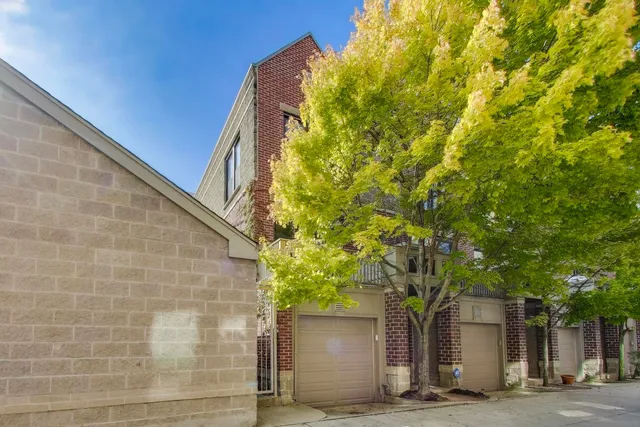 a house with a tree in front of it