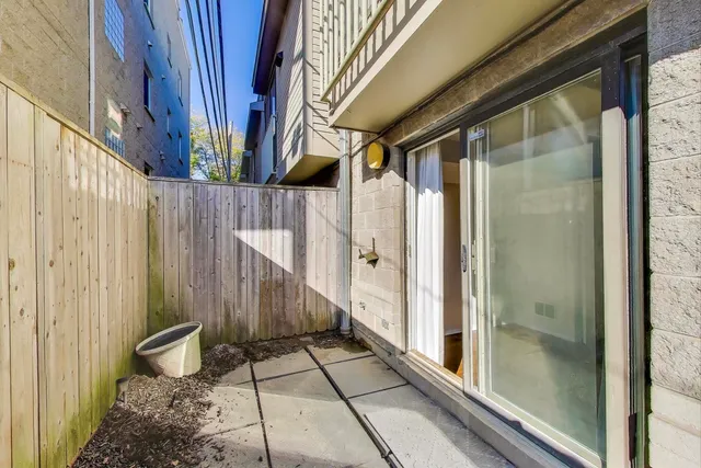 a view of a hallway with washer and dryer