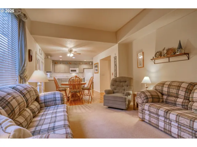 a view of a hallway view with staircase
