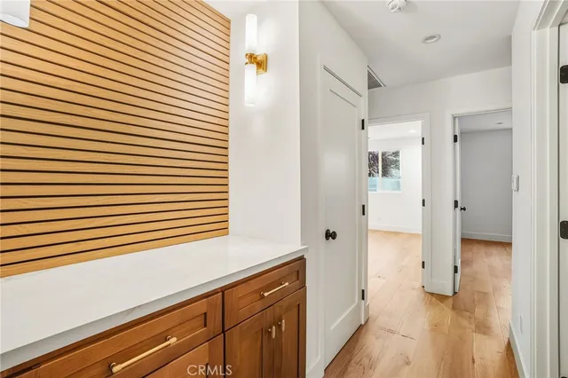 a view of a kitchen from the hallway