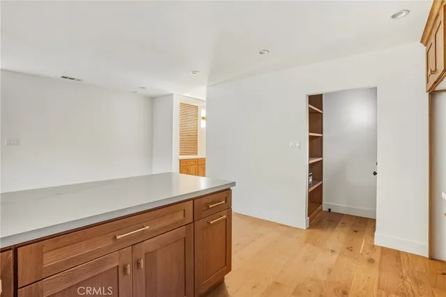 a kitchen with a sink and a window