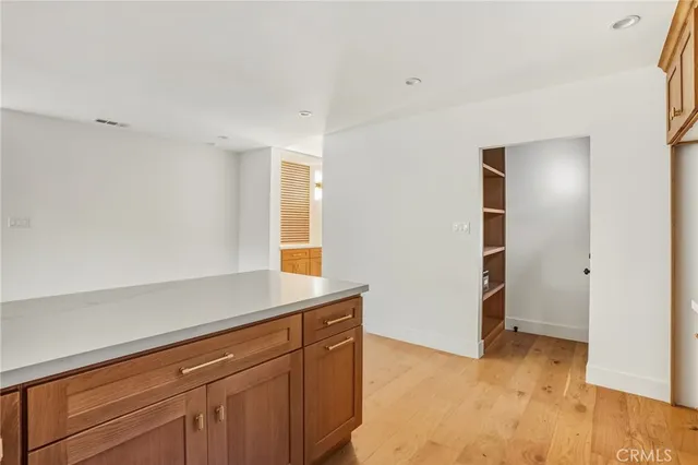 a kitchen with a sink and a window